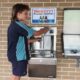 Year 8 student Noah Charles fills up at Kariong Mountains High School's chilled water station.