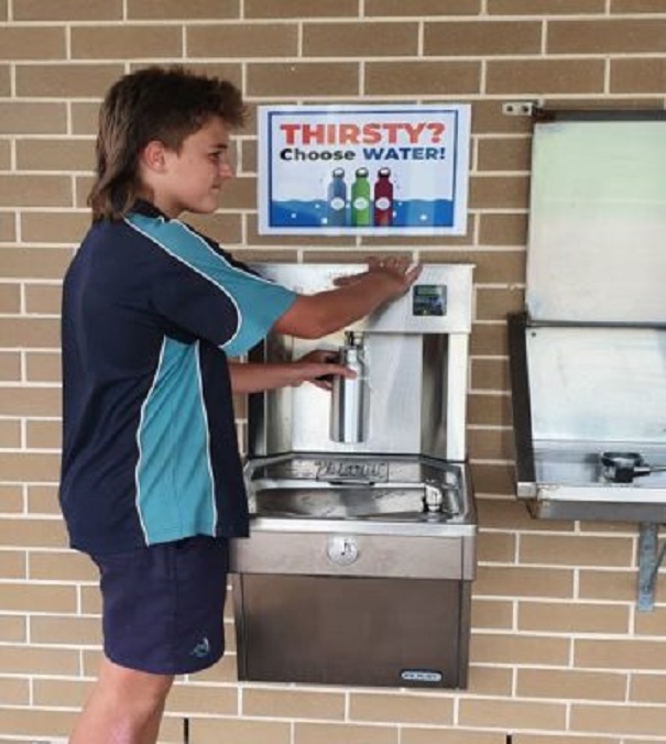 Year 8 student Noah Charles fills up at Kariong Mountains High School's chilled water station.